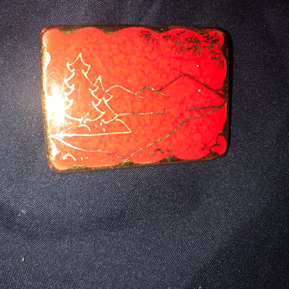 Red and gold pin